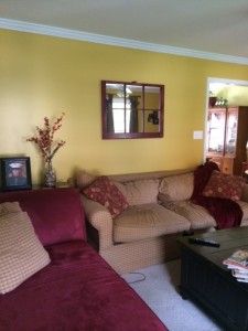 Living Room "Before." See that large, yellow supporting wall? Yep, we took it down!